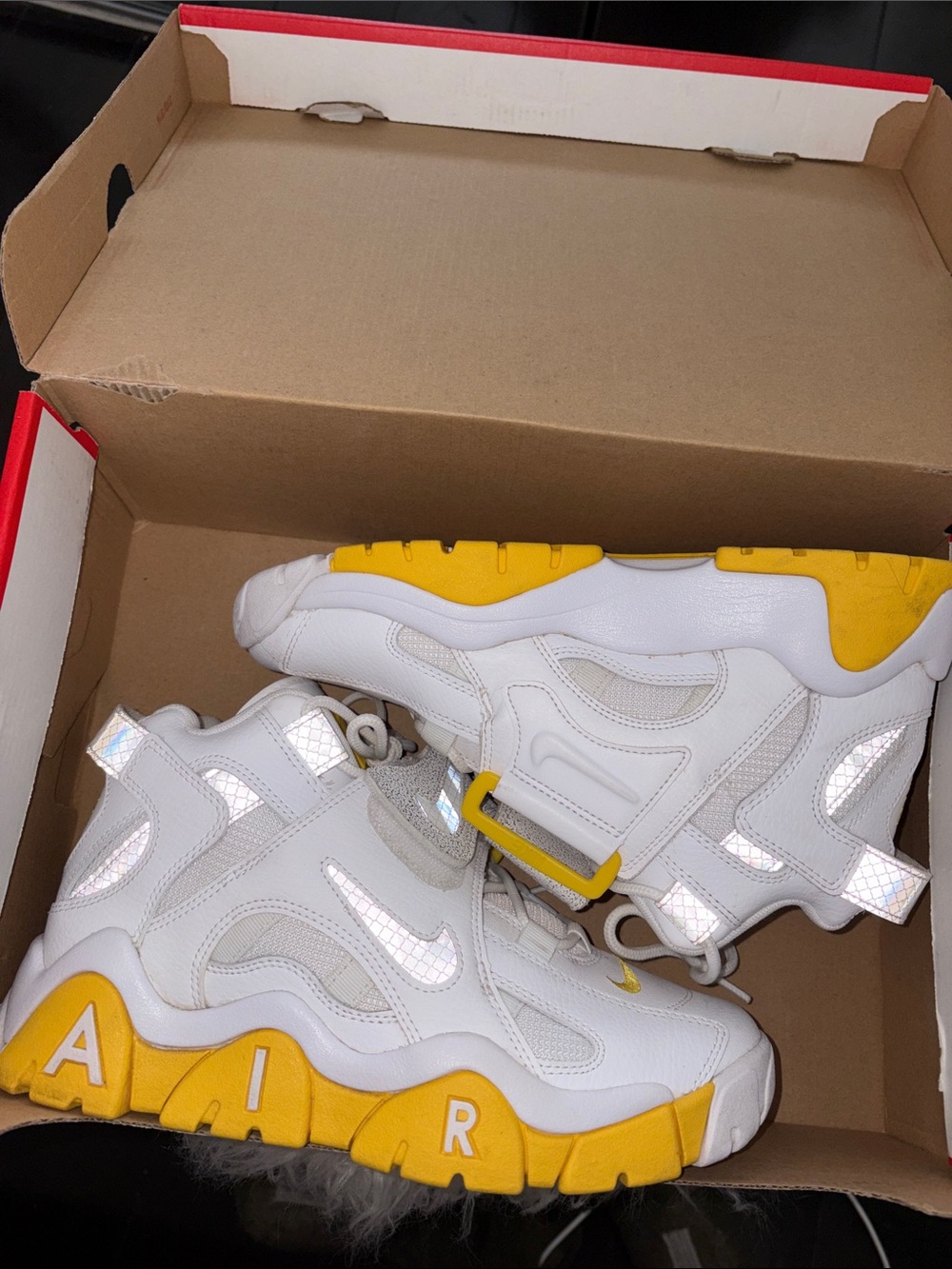 Nike woman’s White and Yellow High-Top Basketball Sneakers